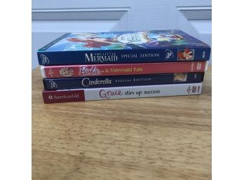 Assorted Disney DVDs With American Girl