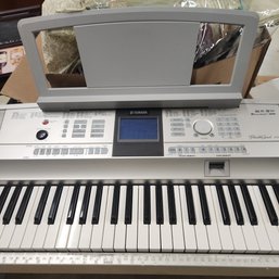 Yamaha Portable Grand DGX-505 With Stool