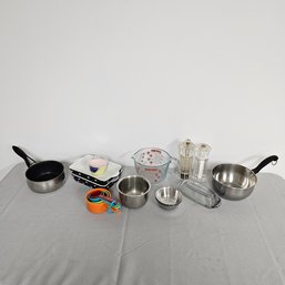 Two Small  Cooking Pots, Measuring Cups Along With A 4 Cup Glass Pyrex Measuring Cup, 2 Small Baking Dishes,