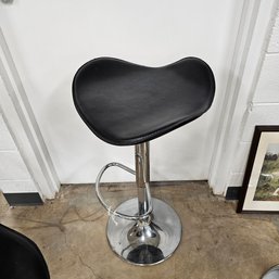 Black And Metal Saddle Stool