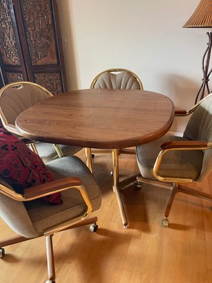 Table And Rolling Chairs