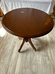 Antique Tilt Top.