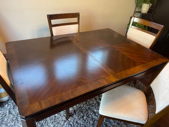 Beautiful Table With Chairs And Leaf