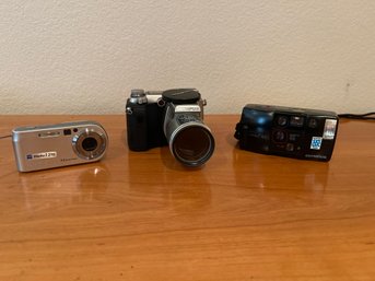 Olympus And Sony Cameras