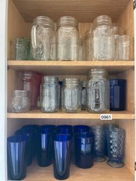 Glassware Including Ball Jars, Blue Glasses And More.