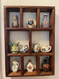 Shelf With Pretty Unique Pottery Items