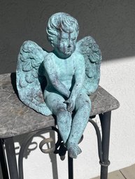 Cast Iron Sitting Cherub With Verdigris Finish