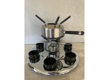 Fondue Pot On Revolving Tray With Sauce Bowls