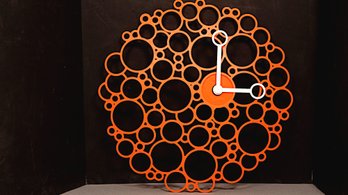 ILOOMI ORANGE PLASTIC  WALL CLOCK