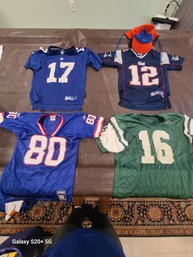 Set Of Four Kids N F L Jerseys Size Medium And Large