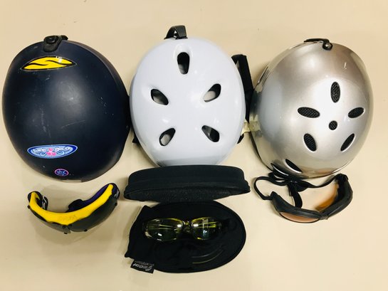 Lot Of Ski Helmets And Glasses