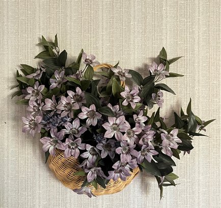 Faux Flowers In Wicker Hanging Basket
