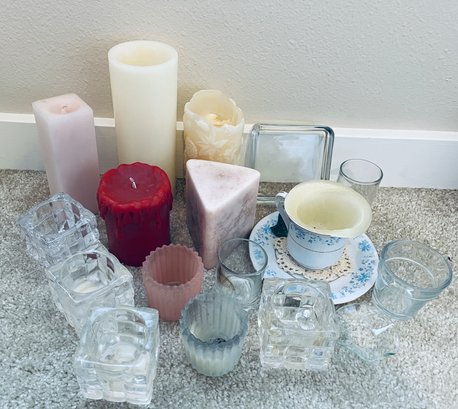 Assortment Of Candles And Candle Holders