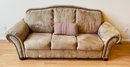 Ashley Furniture Suede Sofa From Loveland Furniture And Decor