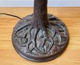 Cast Metal Tree Like Self Standing Lamp With Amber Tone Lamp Shade