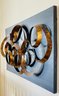 Metallic Rings On Wooden Panel Wall Art