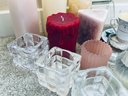 Assortment Of Candles And Candle Holders