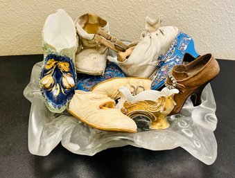 Variety Of Decorative Miniature Shoes And Vintage Baby Shoes