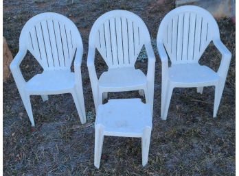 Three Plastic Patio Chairs And Plastic Side Table
