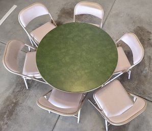 Table And Six Metal Folding Chairs