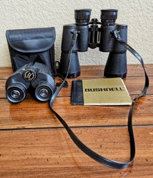 Bushnell Binoculars With A Small Pair With Case
