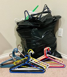 Lot Of Assorted Colored Plastic Hangers