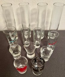 An Assortment Of Shot Glasses Incl. 7' Skinny Glasses