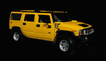 Yellow Hummer H2 Diecast Model By Maisto 1/18 Scale