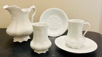 Milk Glass White Tea Cups, Saucers, And Pitcher