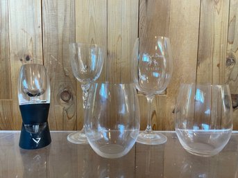 Assortment Of Wine Glasses And Aerator