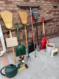 A Lot Of Yard And Garden Tools With A Tote Of Tarps