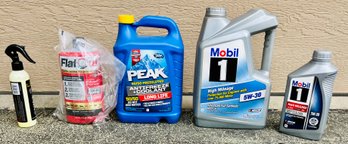 Variety Of Motor Oil And Other Vehicle Chemicals