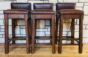 3 Bar Stools With Leather Upholstery