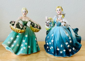 Porcelain Figurines Of Colonial Women With Flower Baskets