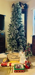 Lot Of Christmas Decorations Including A Beautiful Snow Dusted Fir Tree