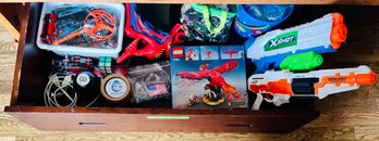 Collection Of Toys, Games, And Nerf Guns