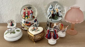 An Assortment Of Home Decor Incl. Snow Globes, Vtg Pink Satin Glass Fairy Lamp, Trinket Boxes And More