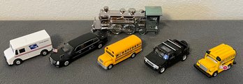 A Collection Of Die-cast Cars Incl. Buses, Mail Truck And A Vintage Avon Train Cologne