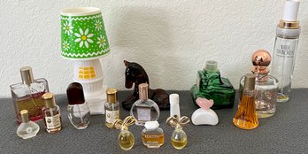 An Assortment Of Vintage Perfume Bottles Incl. Avon, White Diamond, Este Lauder And More