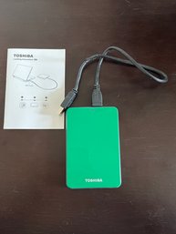 Green Toshiba Portable Charger