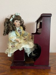 Porcelain Doll Playing Piano