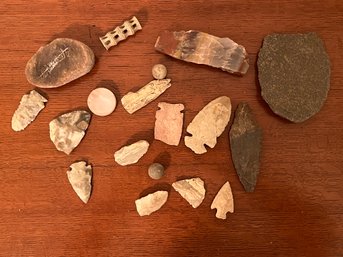 Collection Of Primitive Artifacts Including Arrowheads And Fossil