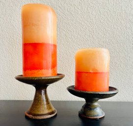 Pair Of Colorful Candles With Candleholders