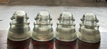 Four Armstrong Embossed Glass Insulators