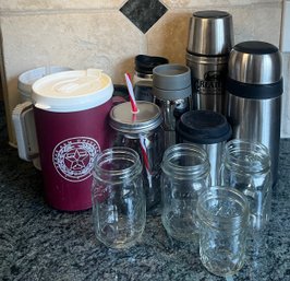 A Variety Of Ball Jars And Travel Cups