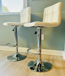 Pair Of White And Chrome Swivel High Bar Chairs