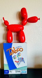 Taboo Board Game With Red Squeakee Balloon Dog Toy