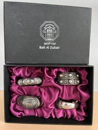 Boxed Set Of 4 Metallic Napkin Rings Marked Bait Al Zabair