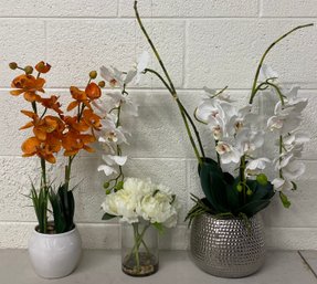 Grouping Of Faux Floral Arrangements