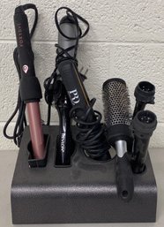 Grouping Of Hair Styling Needs Including A Curling Iron And More